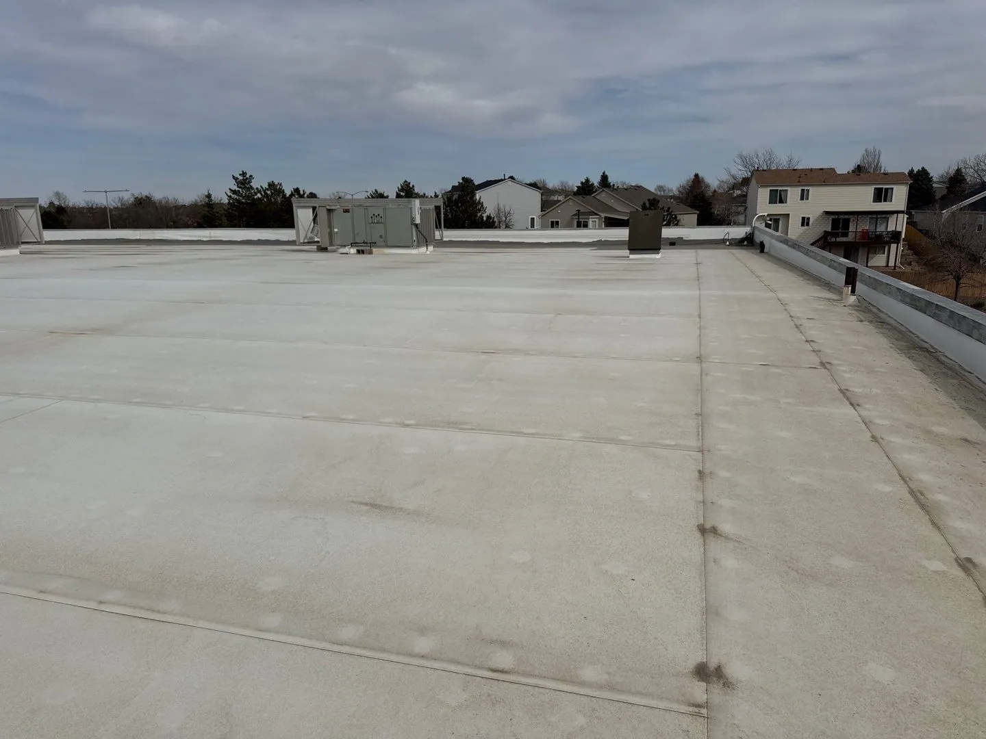 Peak to Peak Roofing crew completing commercial tpo roofing services in Denver